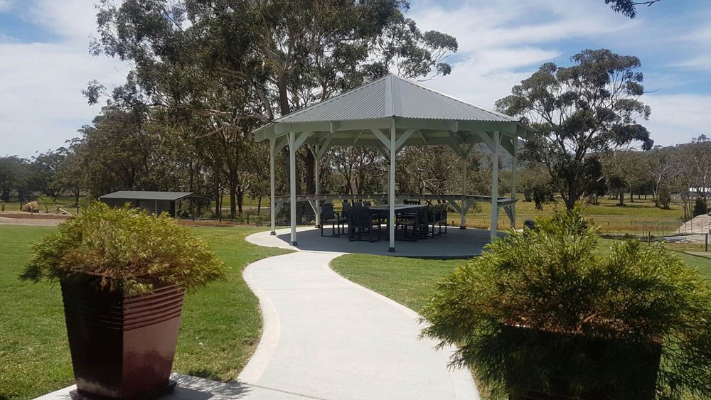 Gazebo with Table and Chairs in a Park — Coffs Harbour, NSW — Coolamon Concrete Tanks