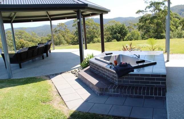 Hot Tub in a Backyard — Coffs Harbour, NSW — Coolamon Concrete Tanks