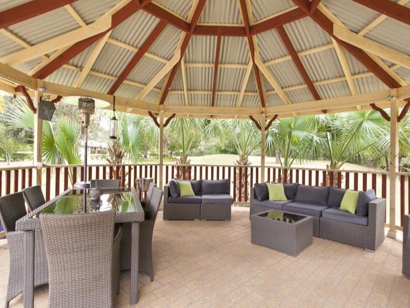 Patio Area with Furniture and a Table — Coffs Harbour, NSW — Coolamon Concrete Tanks