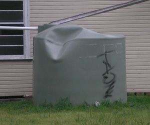 Damaged Plastic Tank — Coffs Harbour, NSW — Coolamon Concrete Tanks