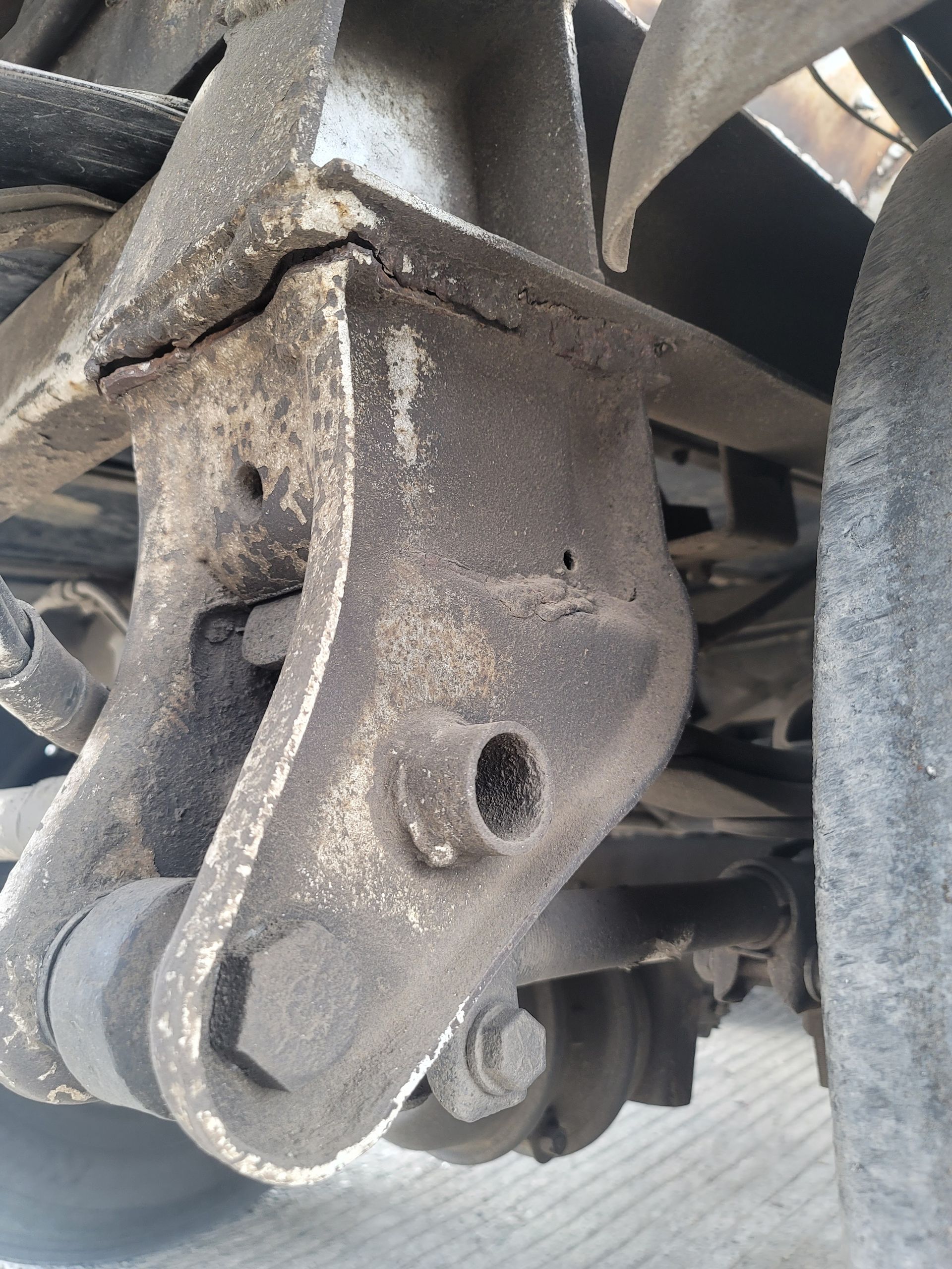 A close up of a piece of metal on a car.