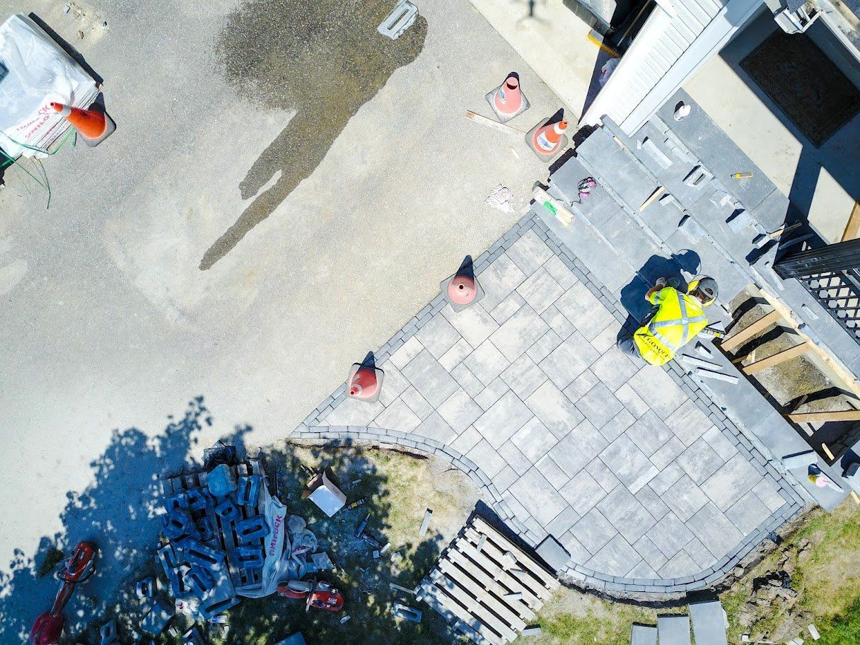 An aerial view of a patio that is being built