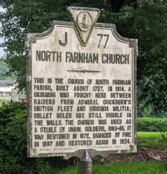 Historical marker for North Farnham Church, detailing its 1737 origin, 1814 skirmish, and 1860s use by Union soldiers.