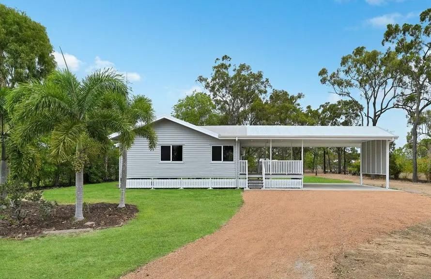 A White House With a Driveway Leading to It — Drawing Works In Townsville City, QLD