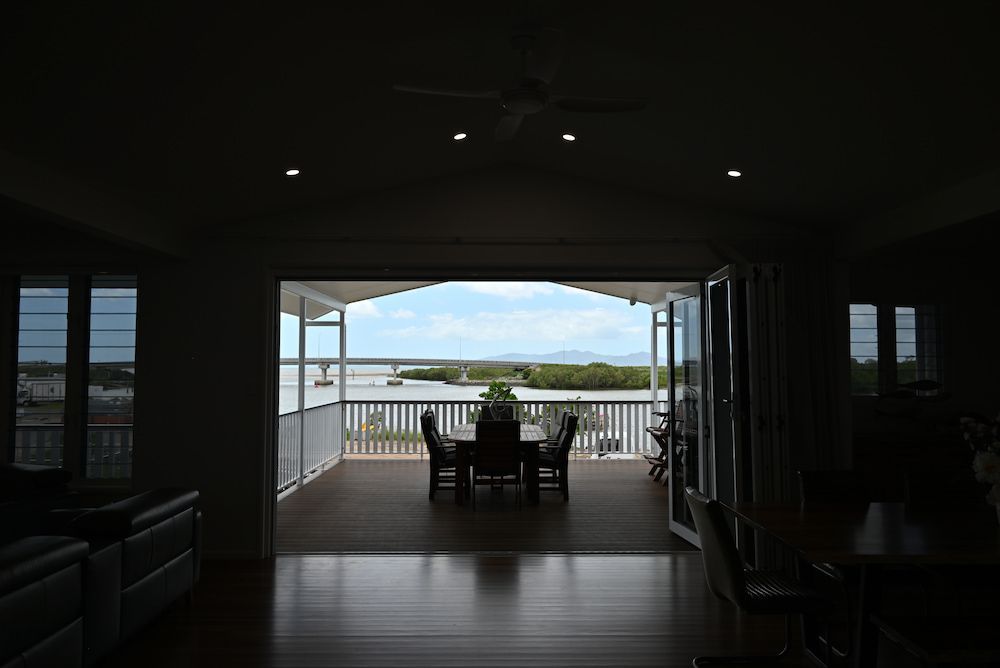 There is a Table and Chairs on the Balcony of a House — Drawing Works In Bowen, QLD