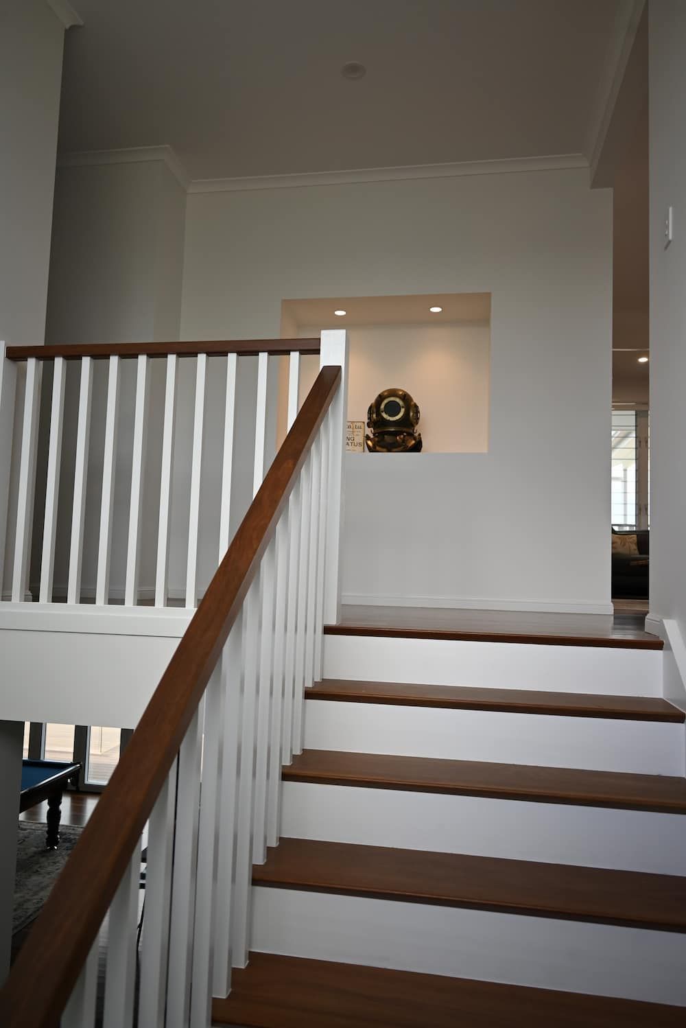 A Staircase With a White Railing and Wooden Steps — Drawing Works In Townsville City, QLD