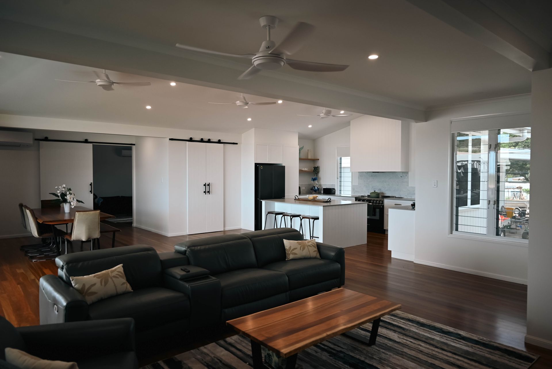 There is a Large Wooden Table in the Middle of the Room — Drawing Works In Ayr, QLD