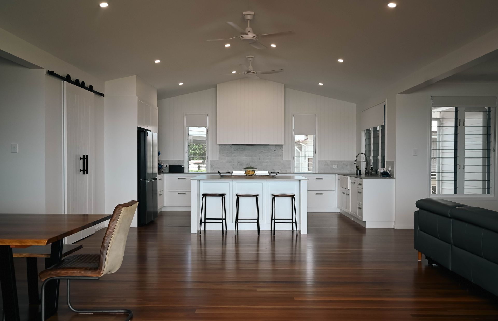 A Living Room Filled With Furniture and a Flat Screen Tv — Drawing Works In Townsville City, QLD