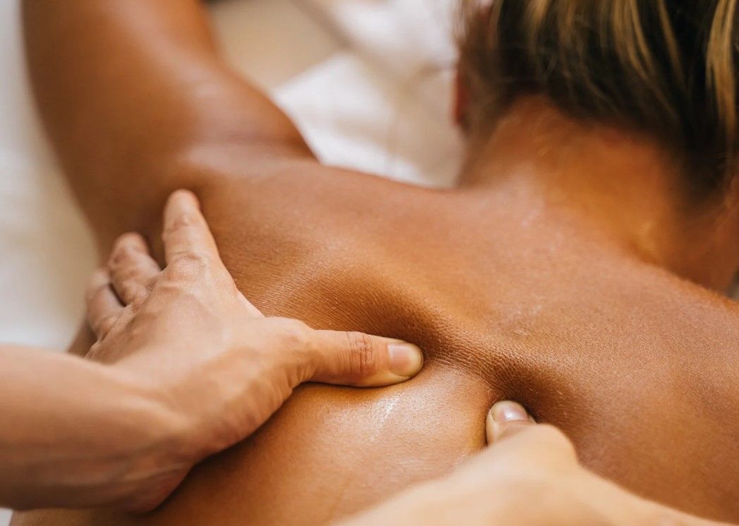 Massage Therapy Coventry performing a deep tissue back sports massage in Coventry