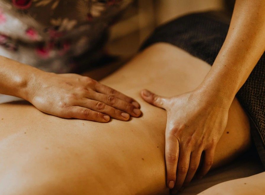 Massage Therapy Coventry performing a sciatica massage for pain in Coventry