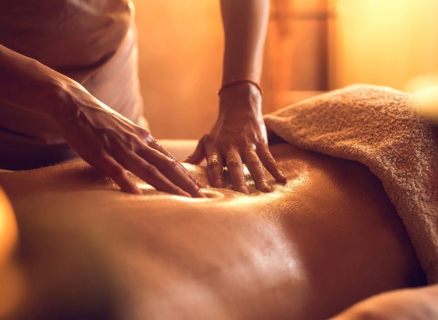 Massage Therapy Coventry performing a deep tissue back massage in Coventry