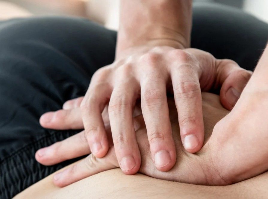 Massage Therapy Coventry performing a sciatica treatment massage in Coventry