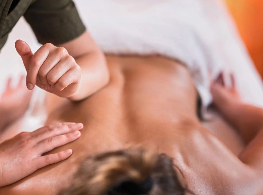 Massage Therapy Coventry performing an elbow sciatica treatment massage in Coventry