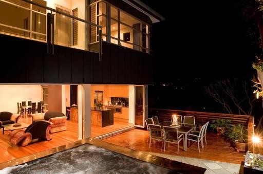 View of outdoor seating arrangement at night