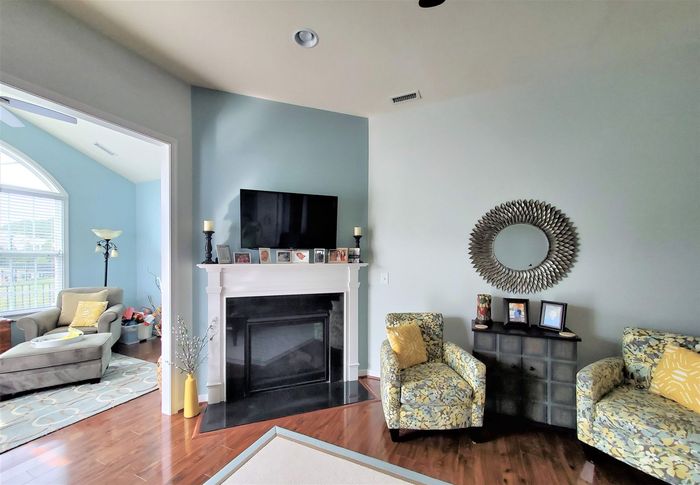 Painter in Mechanicsville, VA: Light Teal Fireplace Accent Wall