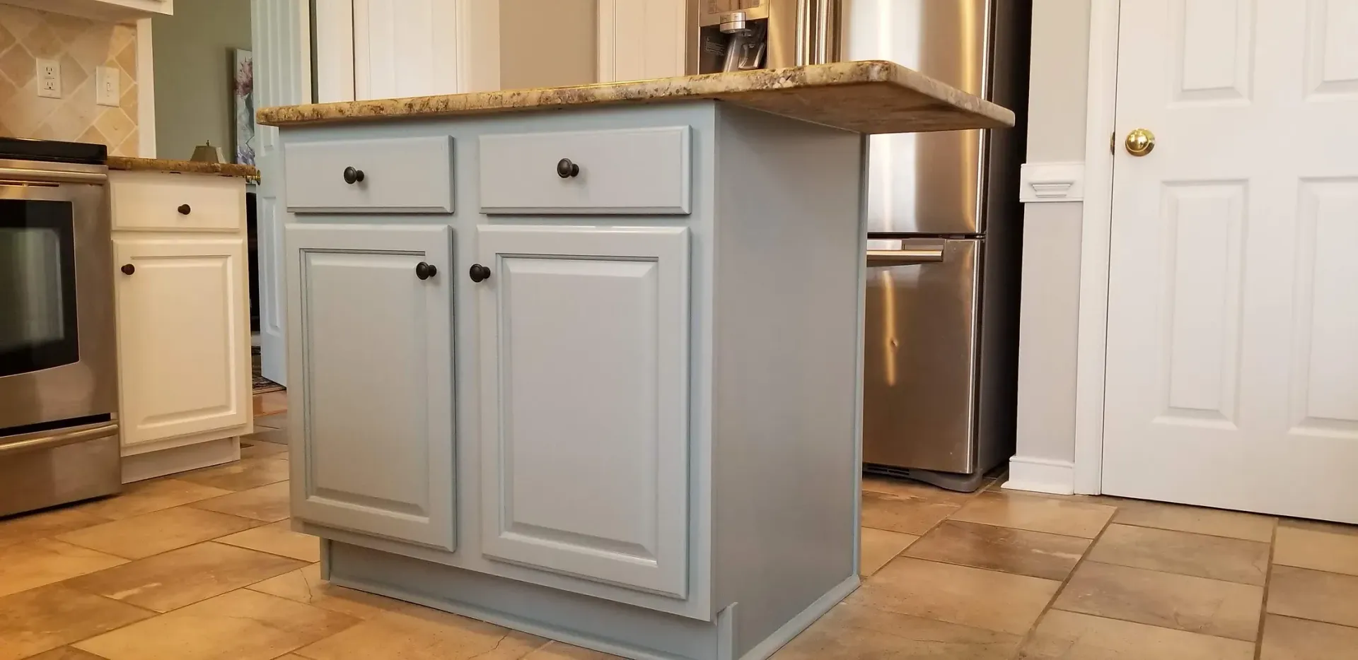 Oak cabinets after
Light Blue painted Kitchen Island