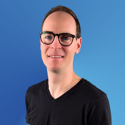 a picture of Brian Crook in blue background