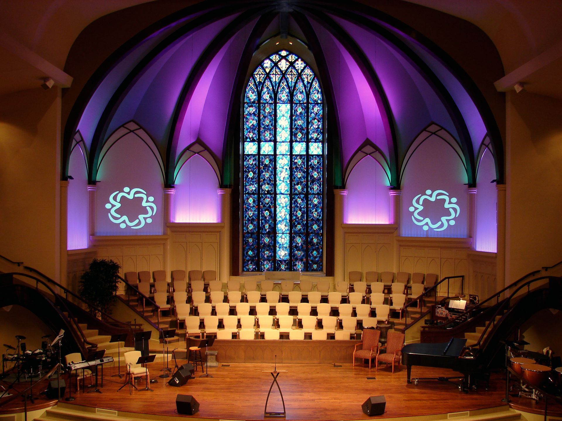 room with cross logo