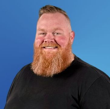 a picture of Chris Burkhart in blue background