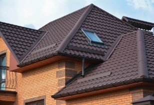 Beautifully installed roof in dark brown colour that matches well with the exterior of the huge residential property in Hobart TAS.