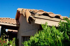 Damaged side part of a roof shingles of a residential home in Hobart TAS.