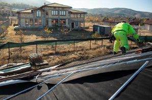 Professional roofer doing repairs on a residential roof in Hobart TAS.