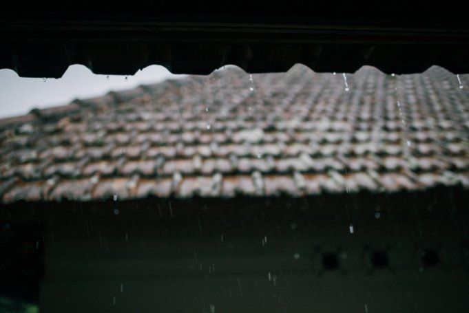 Residential property with a tile brown roofing in Hobart TAS.