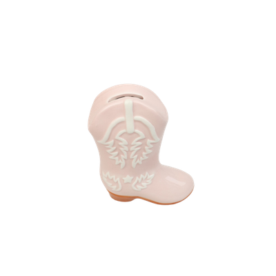 Een lichtroze keramische cowboylaarsdecoratie met witte reliëfdetails en een bruine voet.