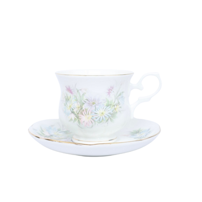 Vintage porseleinen kop & schotel – pastelbloemen