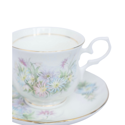 Vintage porseleinen kop & schotel – pastelbloemen