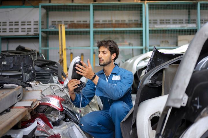 A man work at car garage - Easley, NC - John's Body Shop