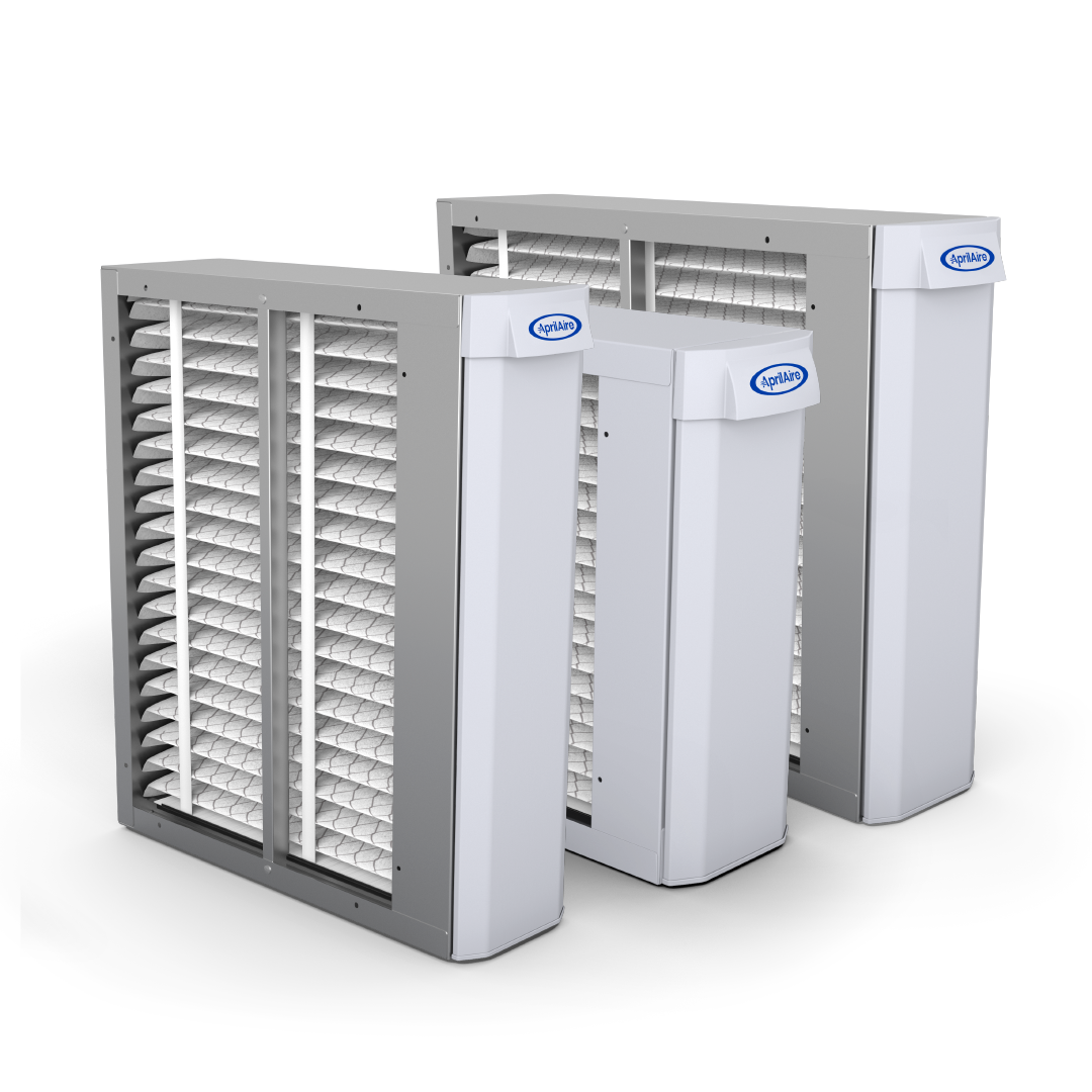 Three air filters are sitting next to each other on a white surface.