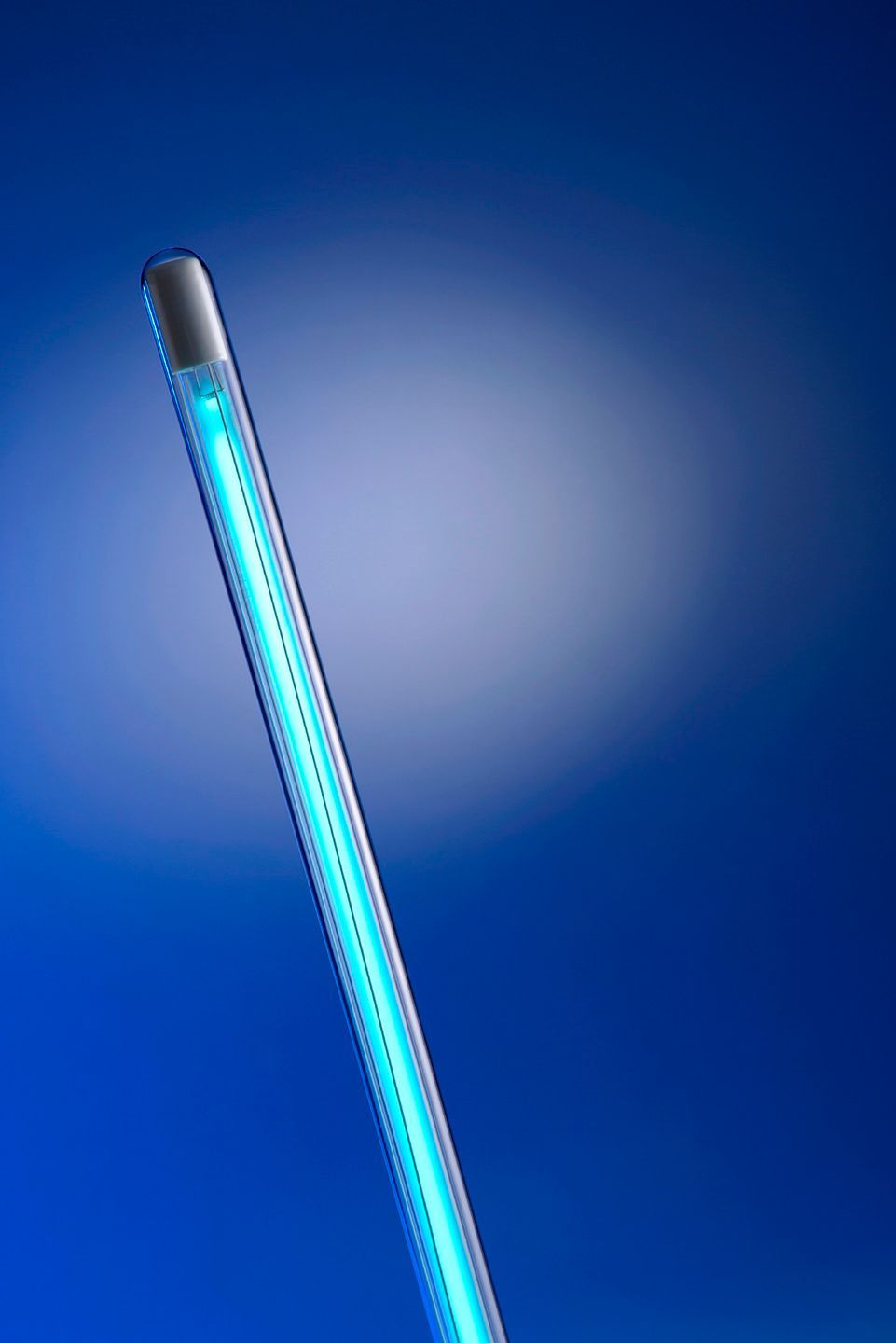 A blue light is shining on a blue background.