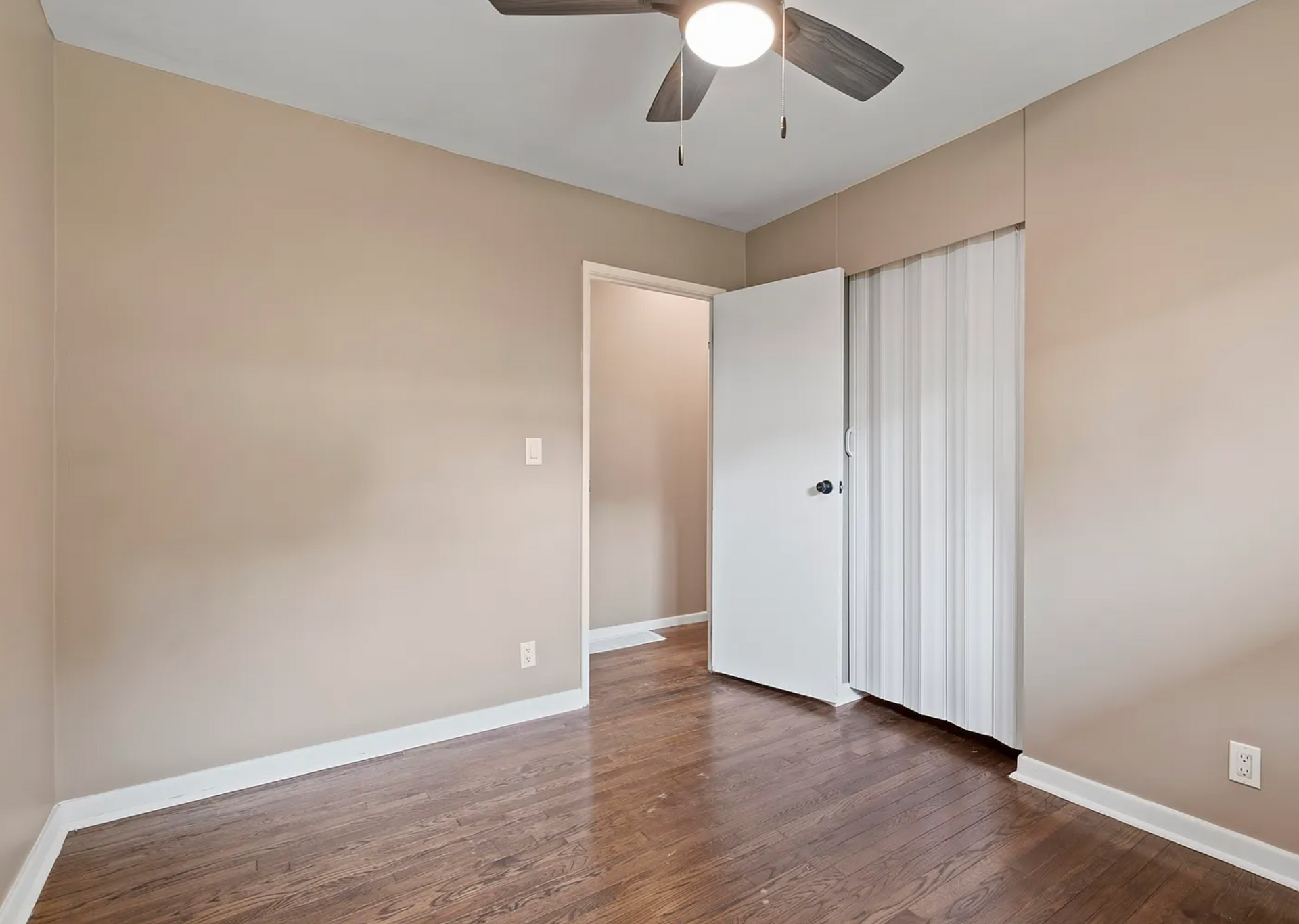 Third remodeled bedroom at Kane St, featuring soft lighting and a welcoming ambiance.