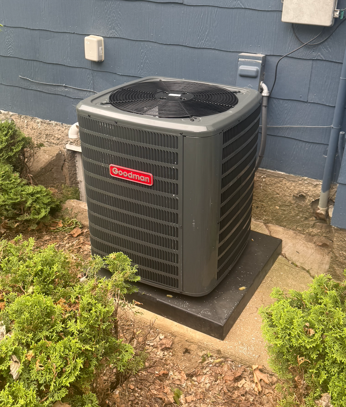 Energy-saving outdoor AC unit connected to updated HVAC system