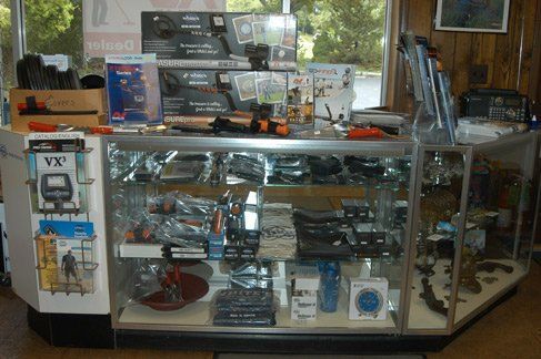 A display case in a store with a sign that says vx on it