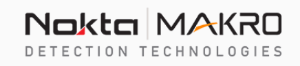 A black and white logo for nokta makro detection technologies