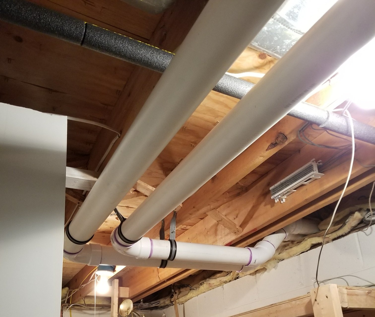 Example HVAC Service Repair with protruding PVC pipes