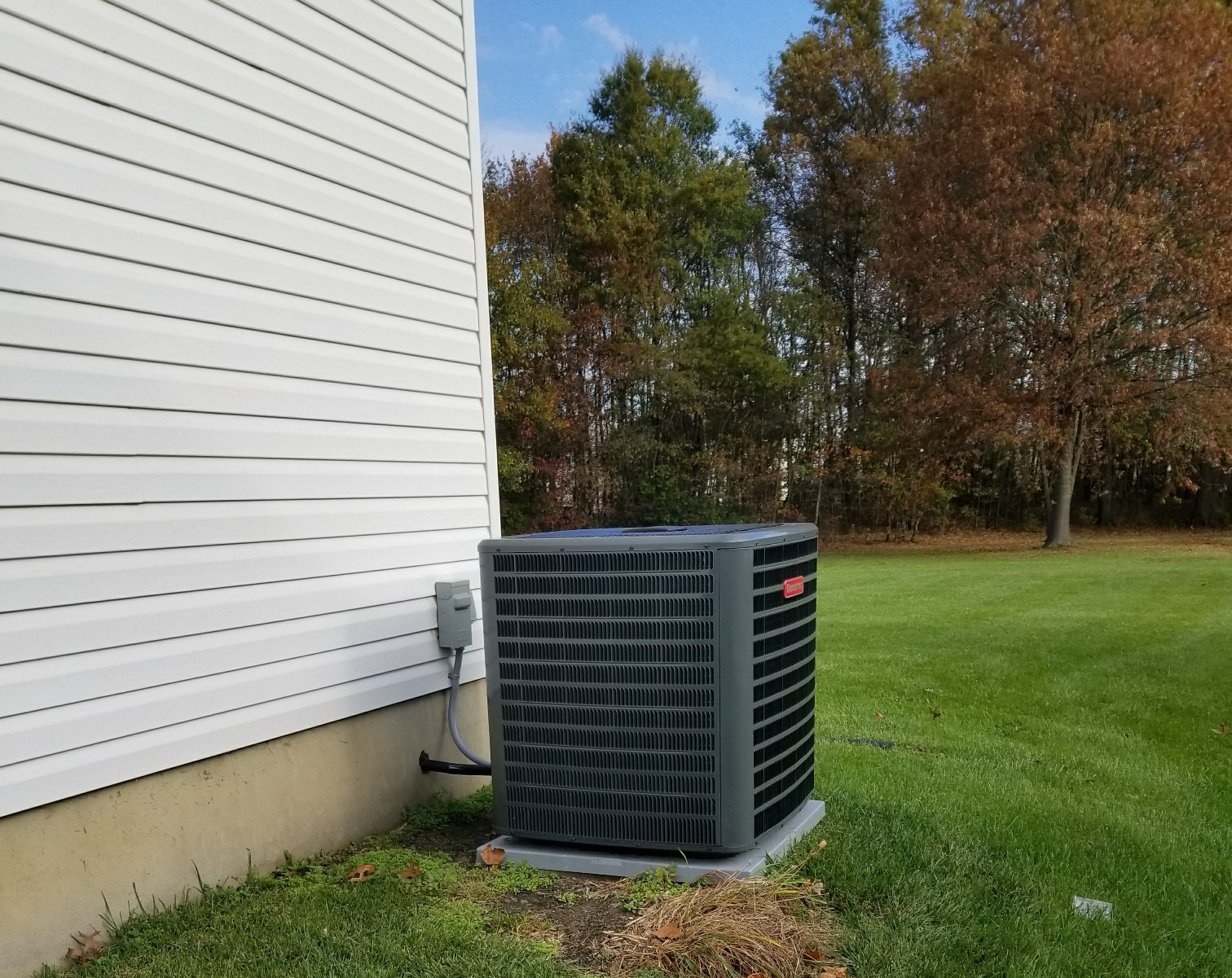 Outside House Air Conditioning unit next to a home in Mt. Laurel, NJ