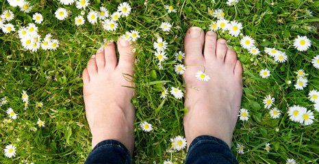 feet on the grass