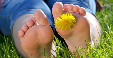feet with a flower