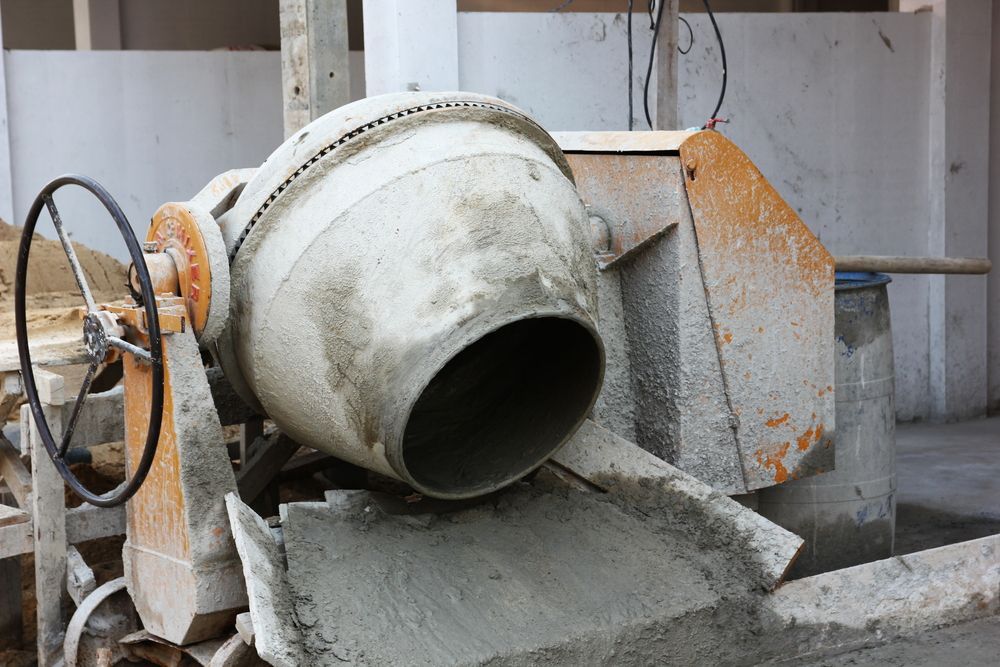 Cement Mixer, Dirty and Used, at a Construction Site, Concrete Spills — Salisbury Concrete Contractors In Mullumbimby, NSW