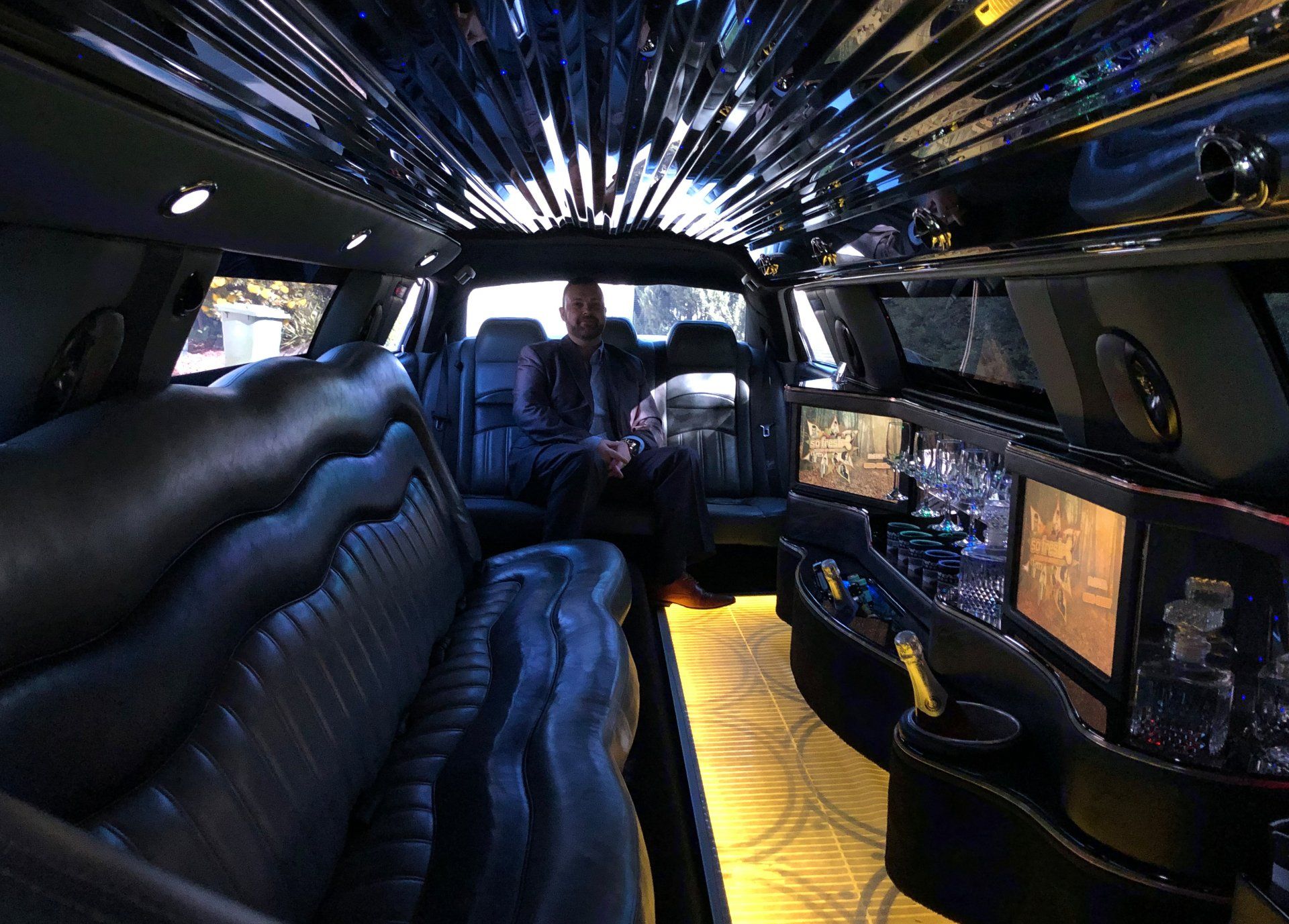 Groom Inside The Luxury Limousine — Superstretch300 Limousines in Golden Beach, QLD