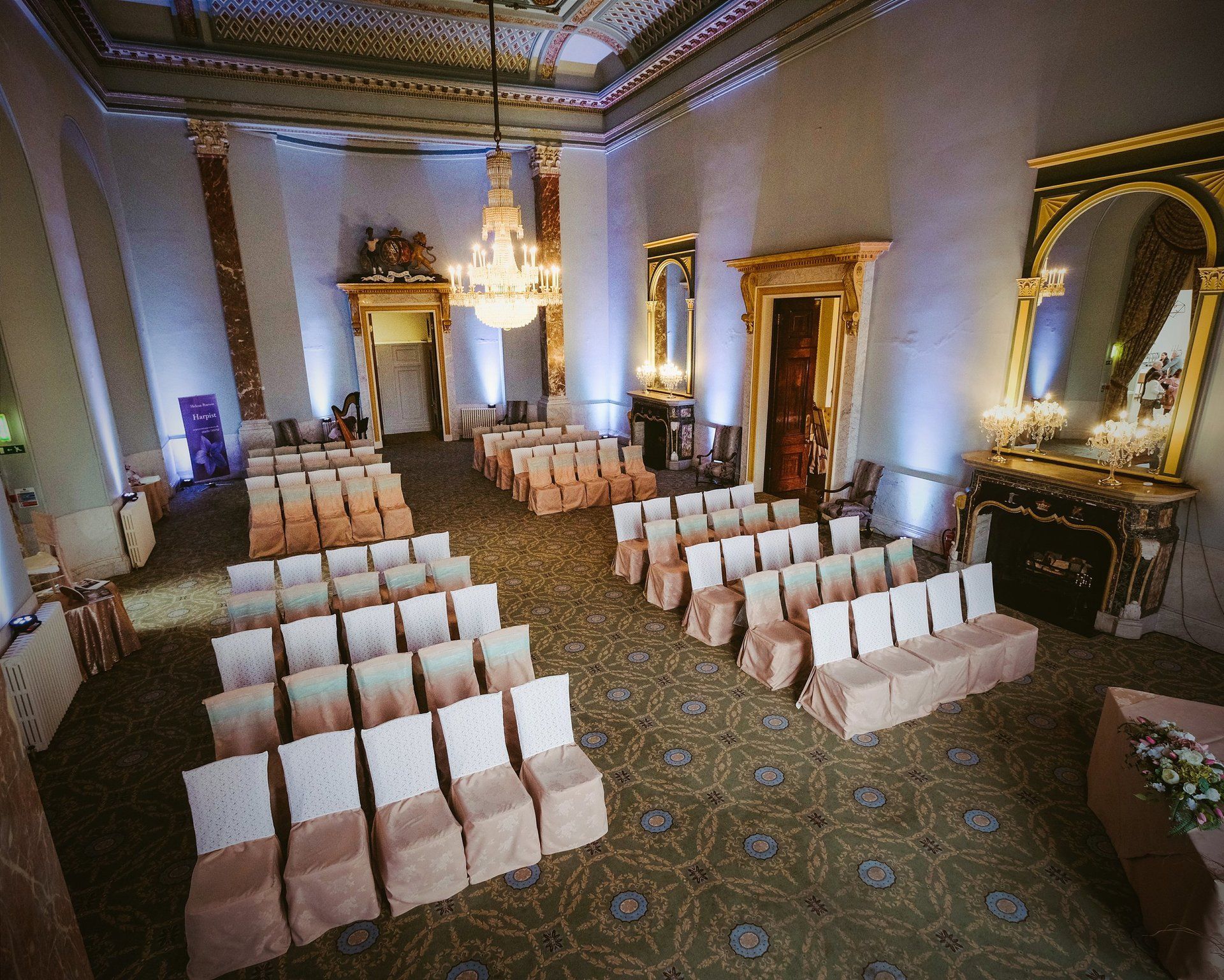 White uplighting in the Ballroom at Wynyard Hall