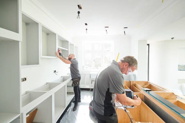 Team fitting a kitchen