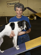 Wonder Dog Training - West Berlin, NJ - A photo of Barbara Khan with a black and white dog