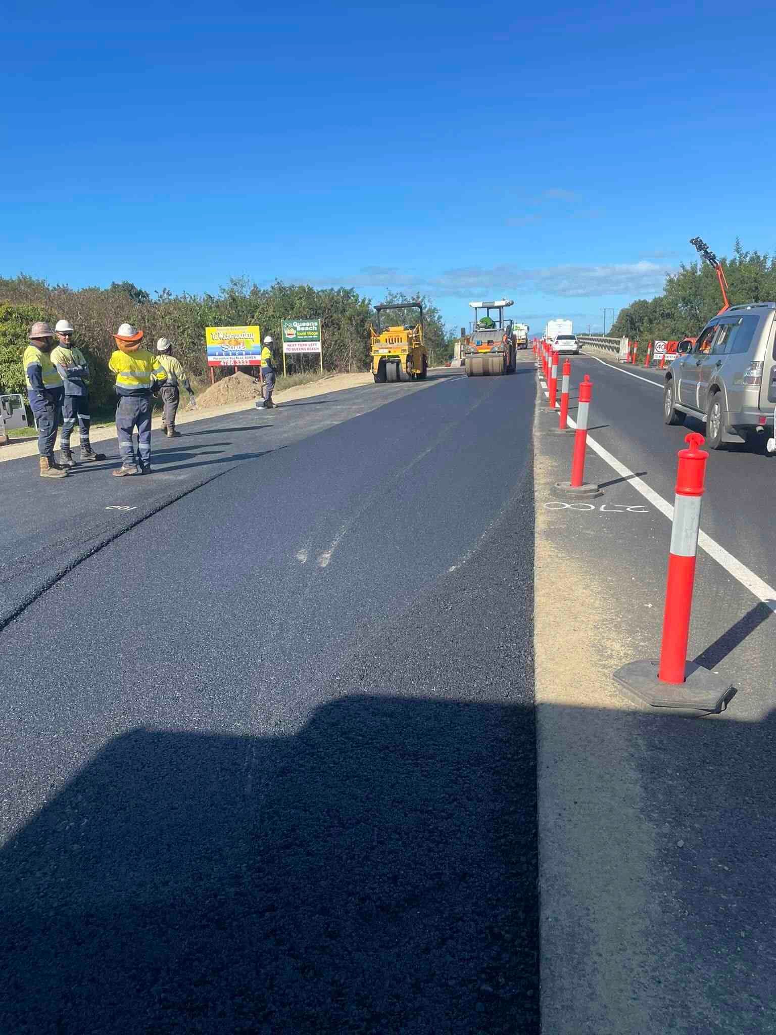 Workers Road Asphalt Patching — Road Construction in Jensen, QLD