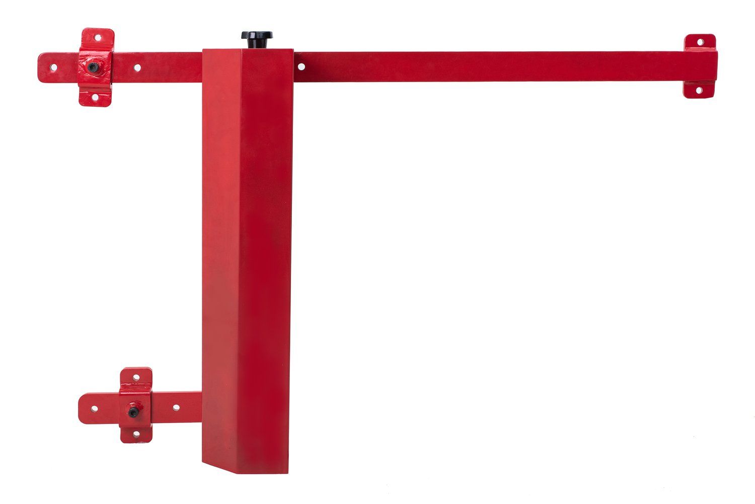 A red metal object is attached to a white wall.