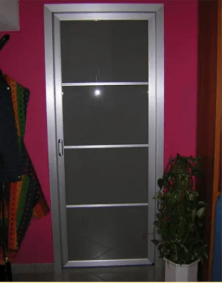 porta con inserti in vetro per interni