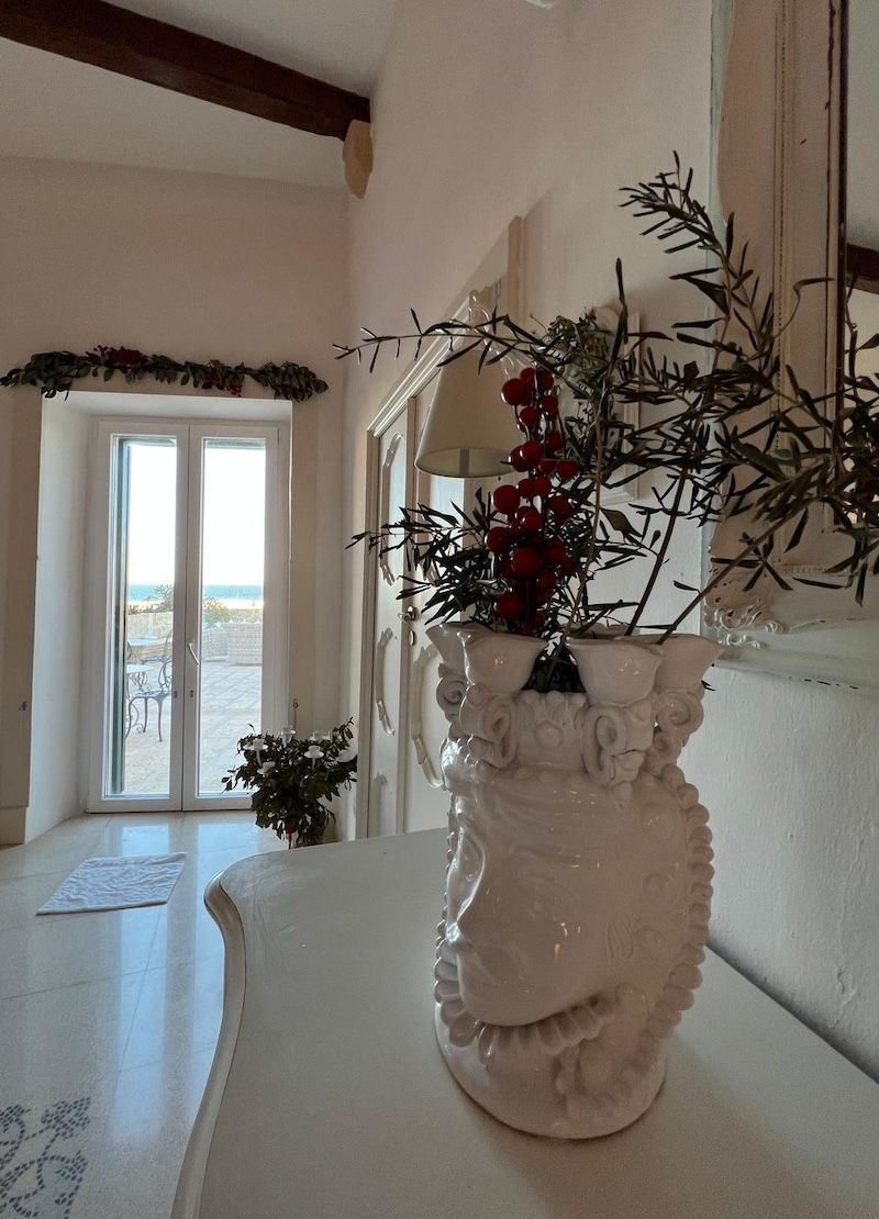 couple sharing a sensual and authentic evening in puglia with local wine